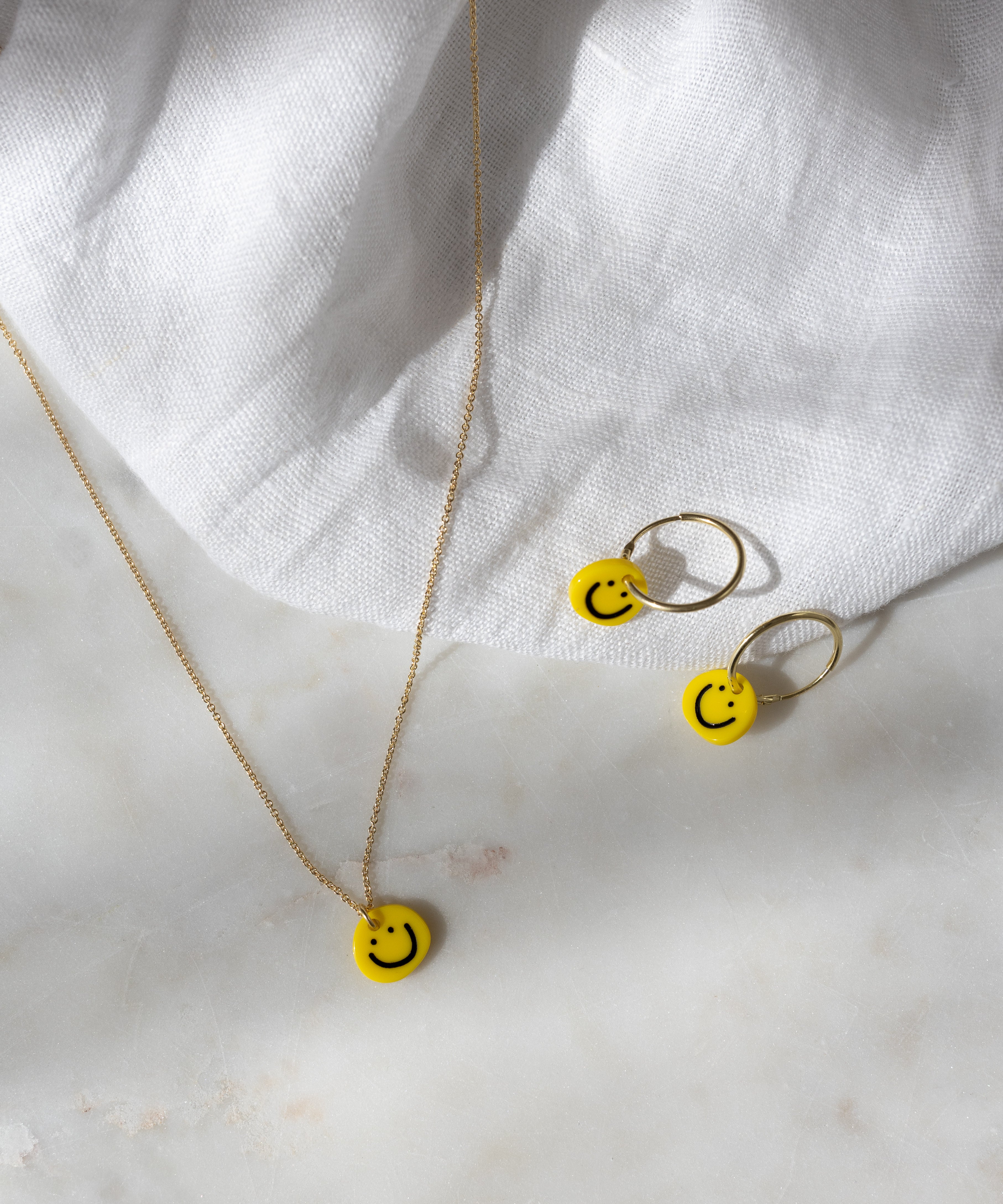wald-berlin-smilie-yellow-earrings-acetat-hoops image 4