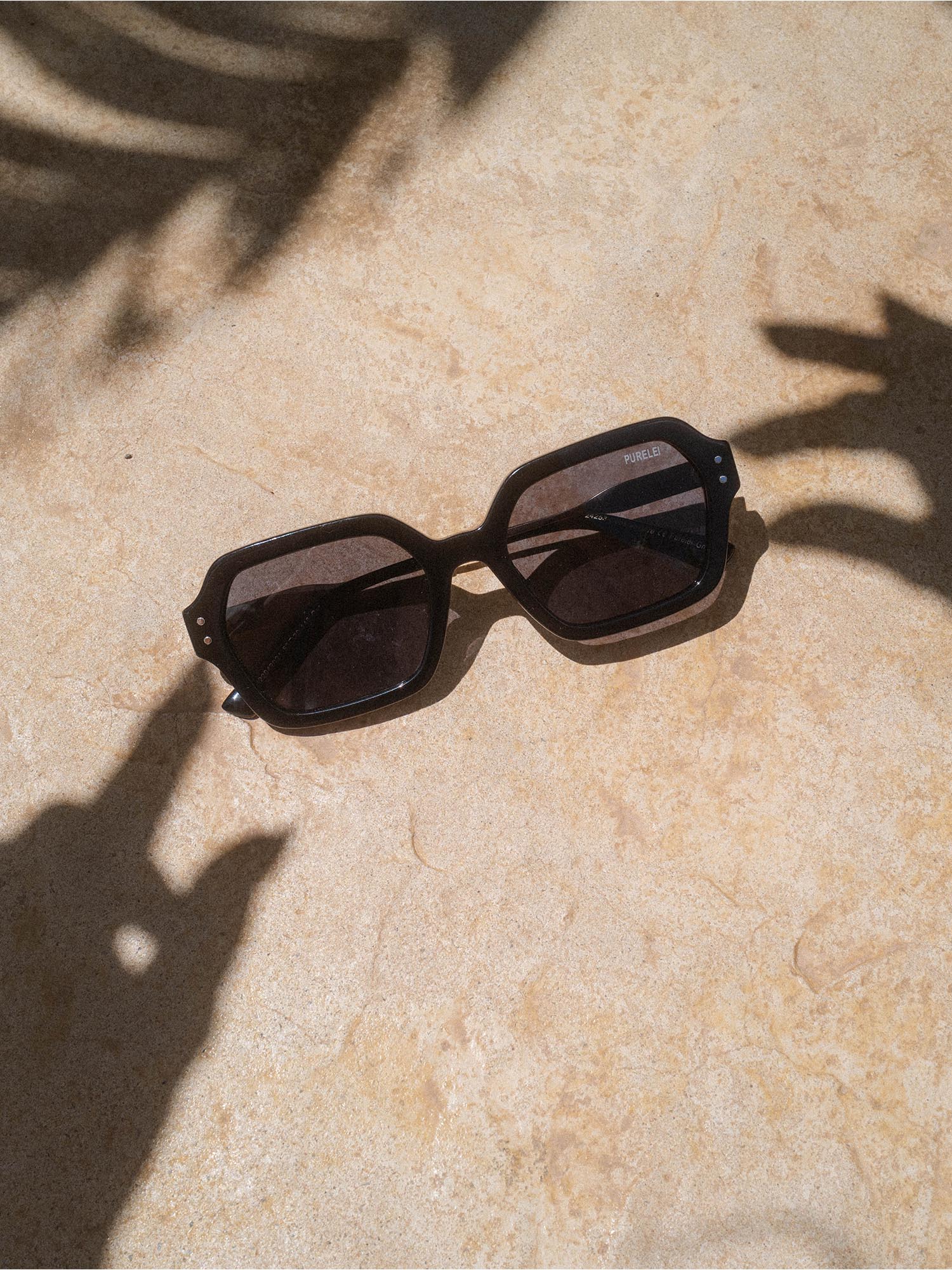 purelei-coastal-core-sonnenbrille-schwarz-gold-oval-uv400 image 5