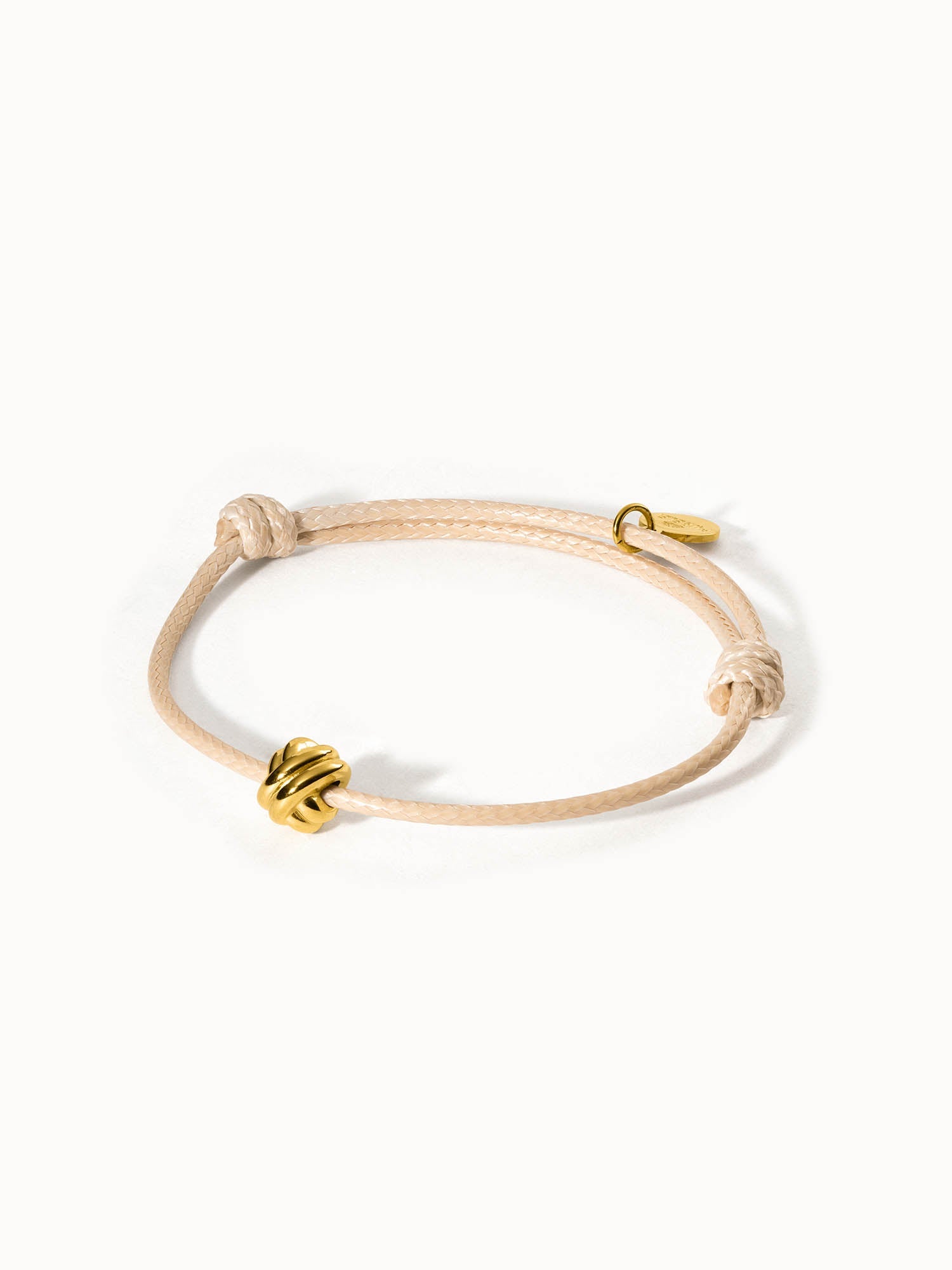 purelei-knot-armband-verstellbares-textilarmband-beige-mit-knoten-anh-nger image 1