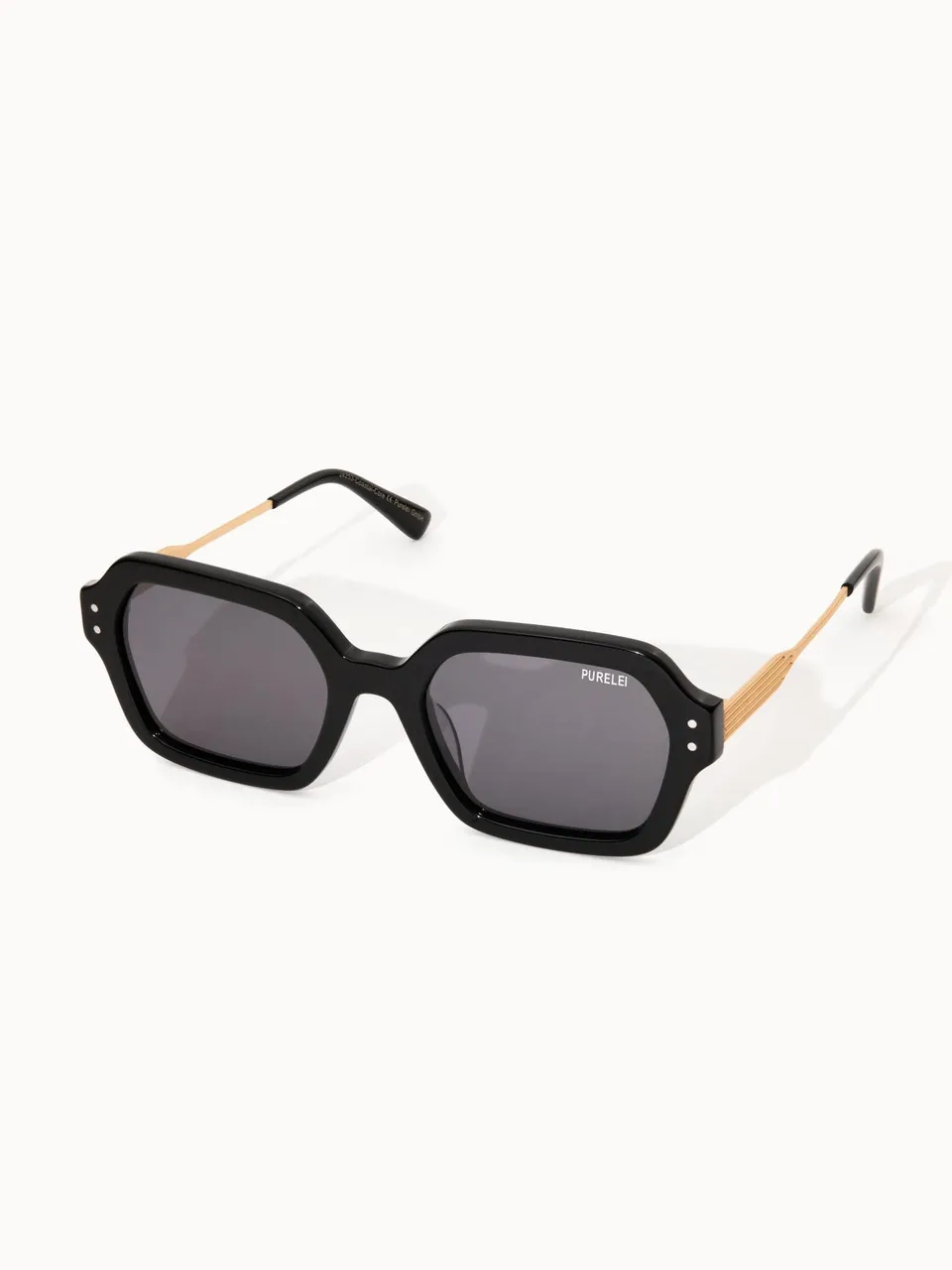 purelei-coastal-core-sonnenbrille-schwarz-gold-oval-uv400 image 1