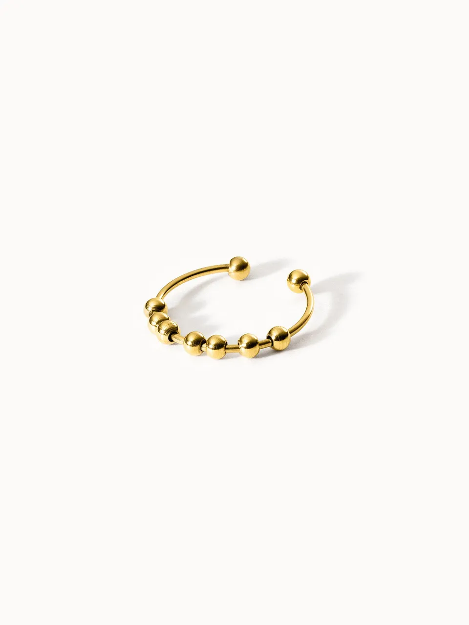 purelei-shade-anxiety-ring-verstellbar-mit-7-kugeln-anti-stress-gold-silber image 1