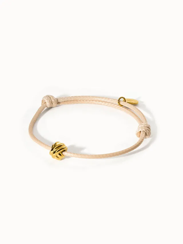 purelei-knot-armband-verstellbares-textilarmband-beige-mit-knoten-anh-nger image 1
