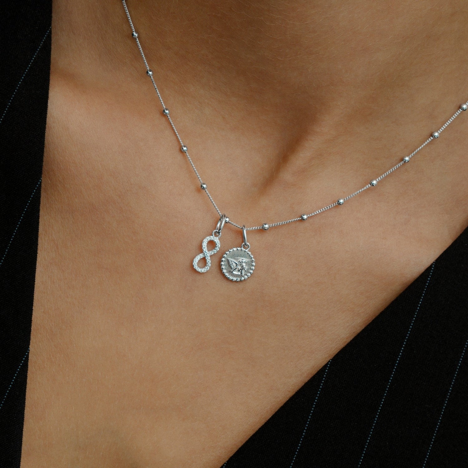 xenox-infinity-charm-925-sterlingsilber-rhodiniert-mit-zirkonia image 3